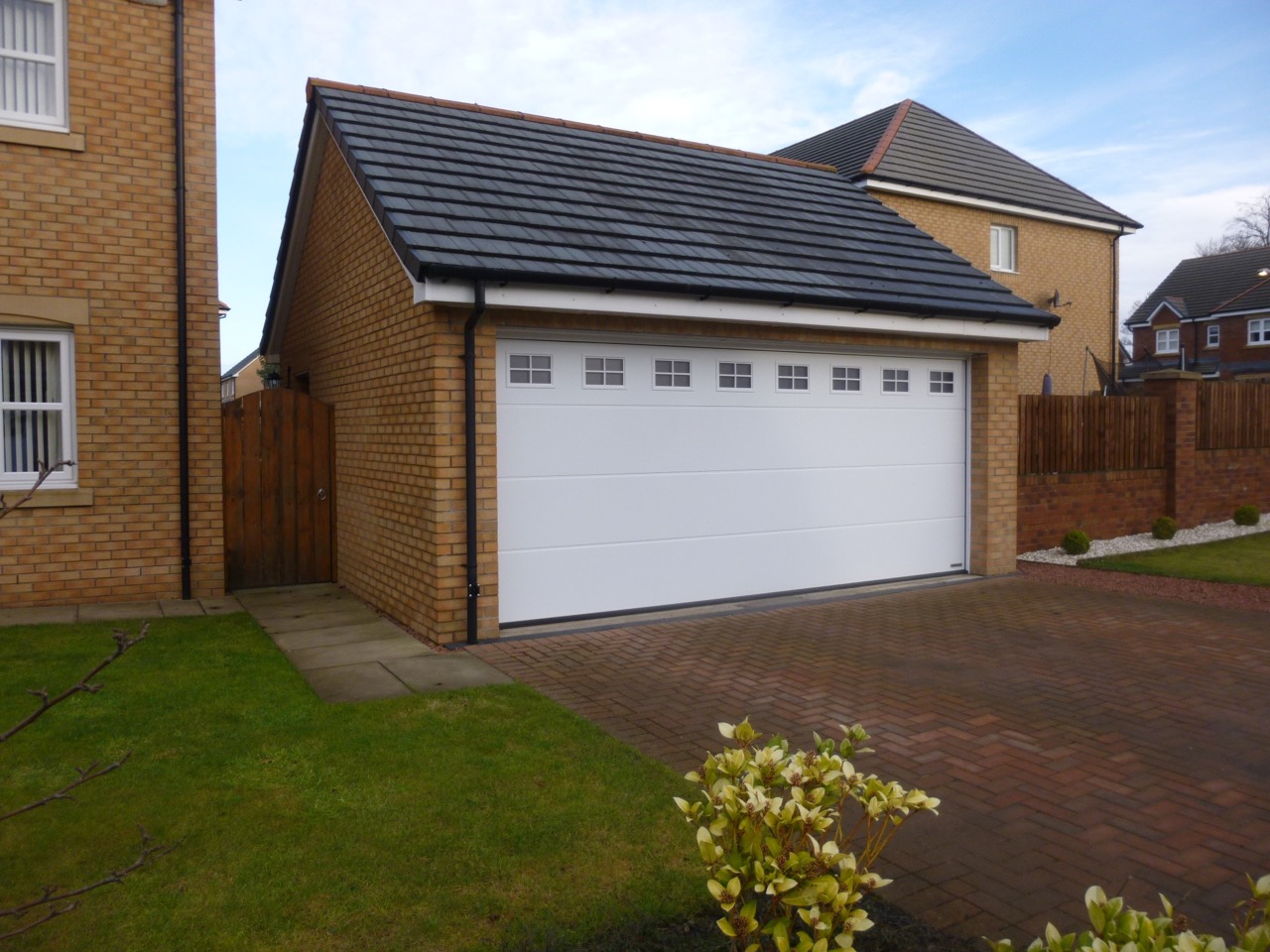 Convert two door garage to one large door - Welsh Builds